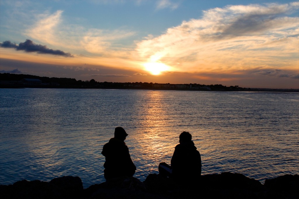 Sea dawn sunset couple
